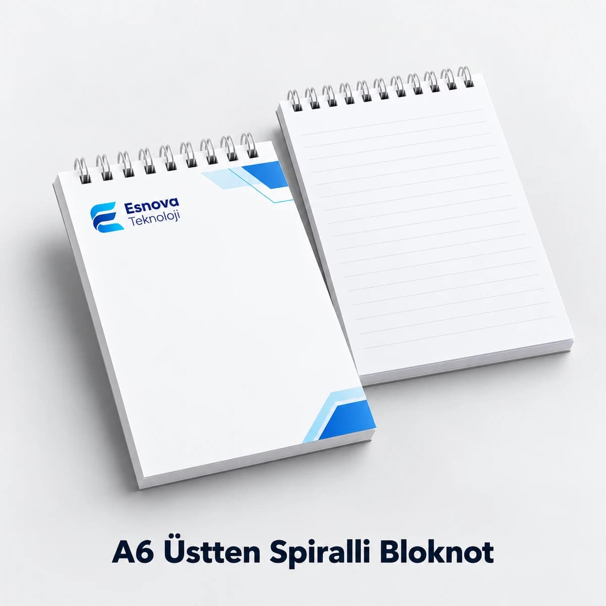 A6 Üstten Spiralli Bloknot Logolu kapağı ve iç sayfasıyla A6 (9 × 13 cm) üstten spiralli bloknot