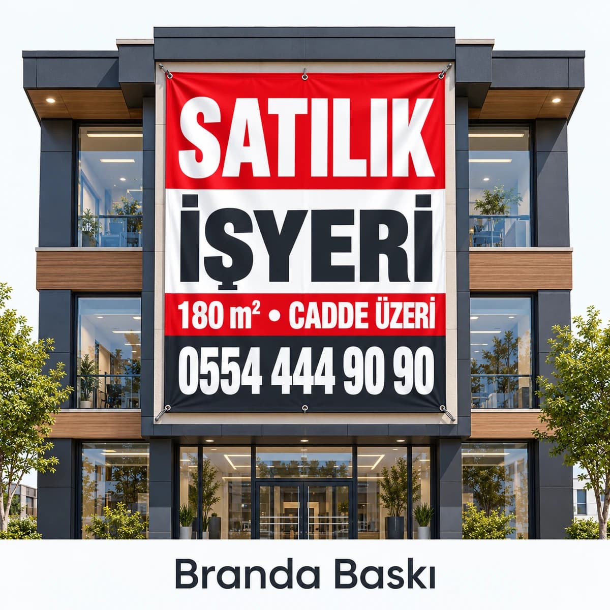 Satılık İşyeri Branda Baskısı İşyeri binasının cephesinde asılı, metrekare ve telefon yazılı kırmızı siyah satılık işyeri brandası