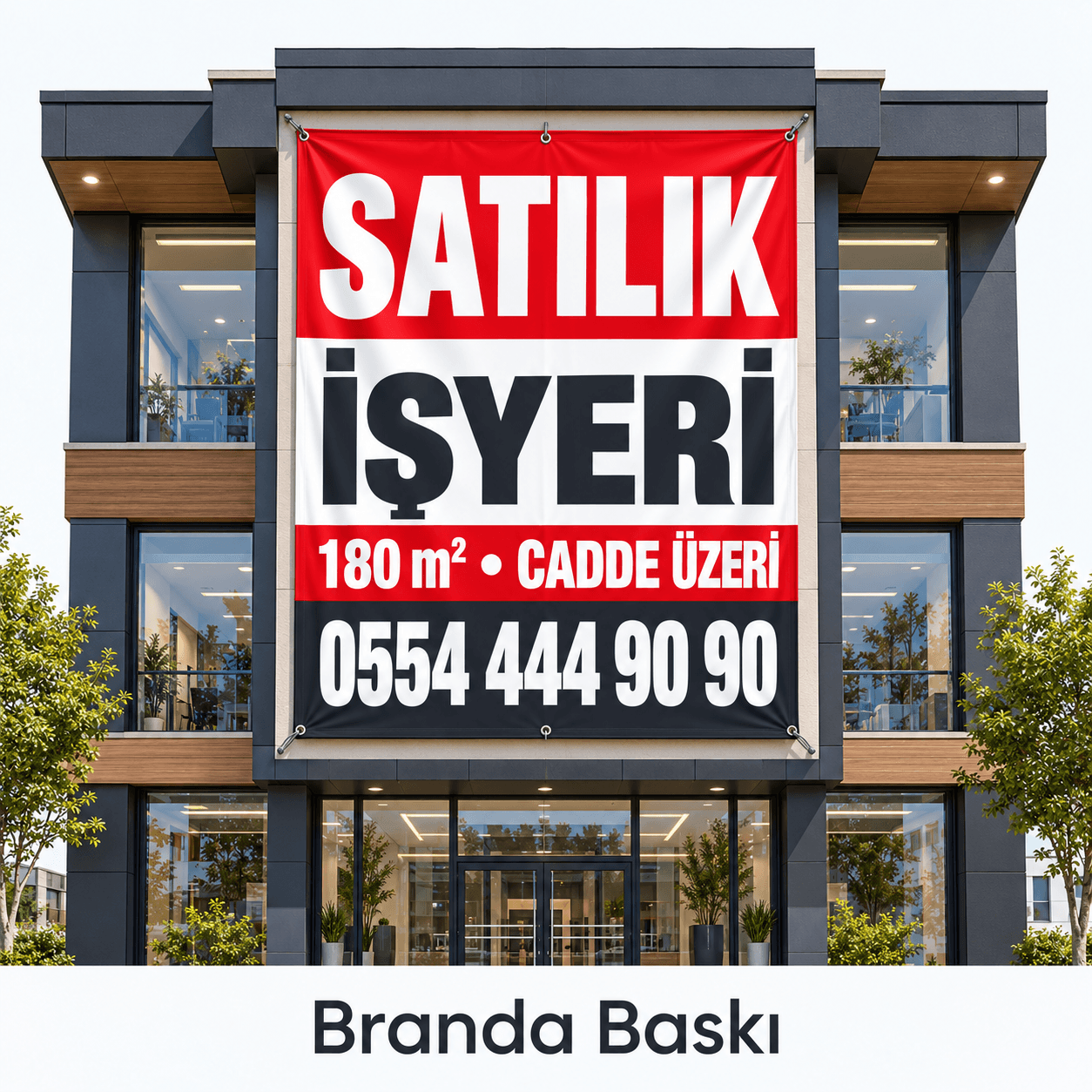 İşyeri binasının cephesinde asılı, metrekare ve telefon yazılı kırmızı siyah satılık işyeri brandası